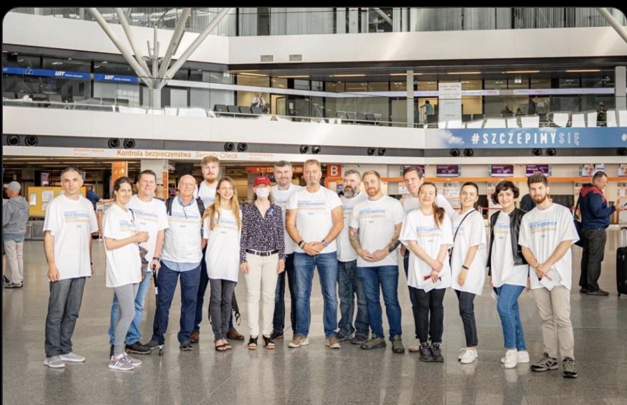 Julia (as Julie Smith) with the team who helped fly Ukrainians from Warsaw to New Brunswick, 2022